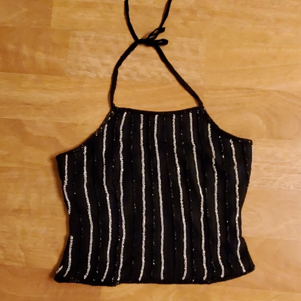 Cache 100% Silk. Polyester Lining.